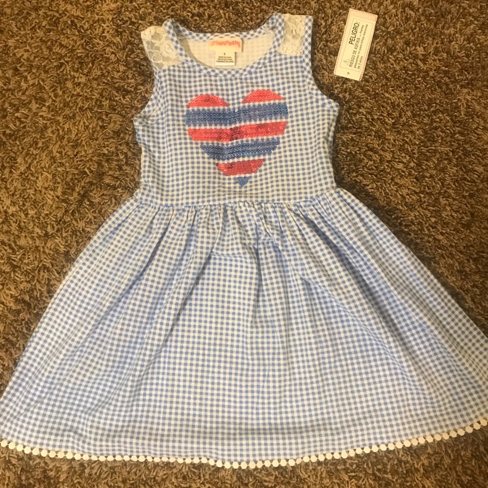 Blue checkered dress with sequined heart.